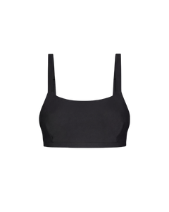 Black crop top with wide shoulder straps and smooth stretch fabric, front view, minimalist design